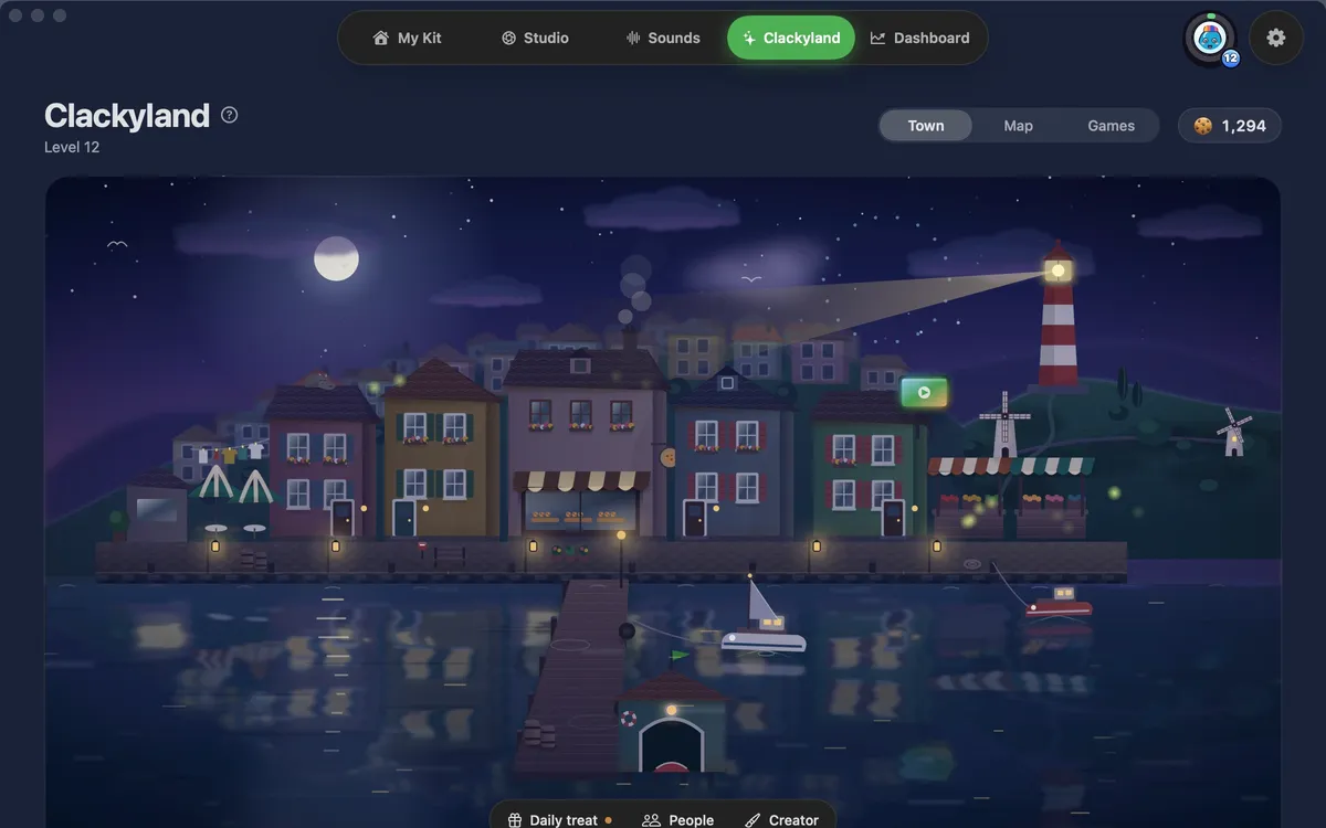Clackyland in the app: the harbour town with its lighthouse, boats and Cookie Factory