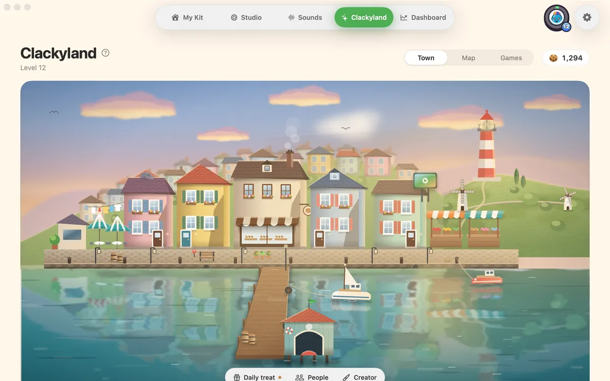 Clackyland in the app: the harbour town with its lighthouse, boats and Cookie Factory